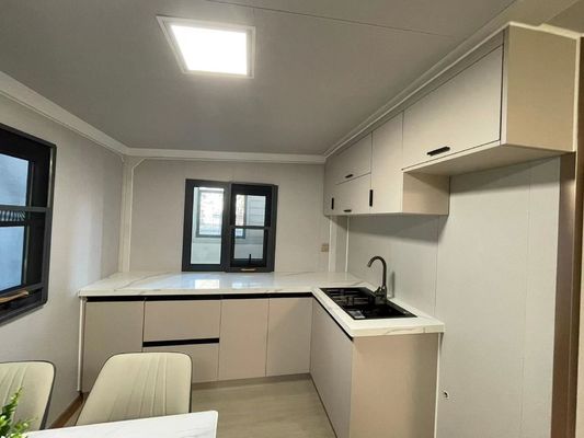 Casa de contenedores prefabricada con ventana de aluminio con sala plegable de doble ala y fácil expansión