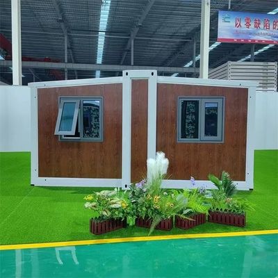 Casa de contenedores de doble ala con puerta de acero rojo y soporte técnico en línea proporcionado